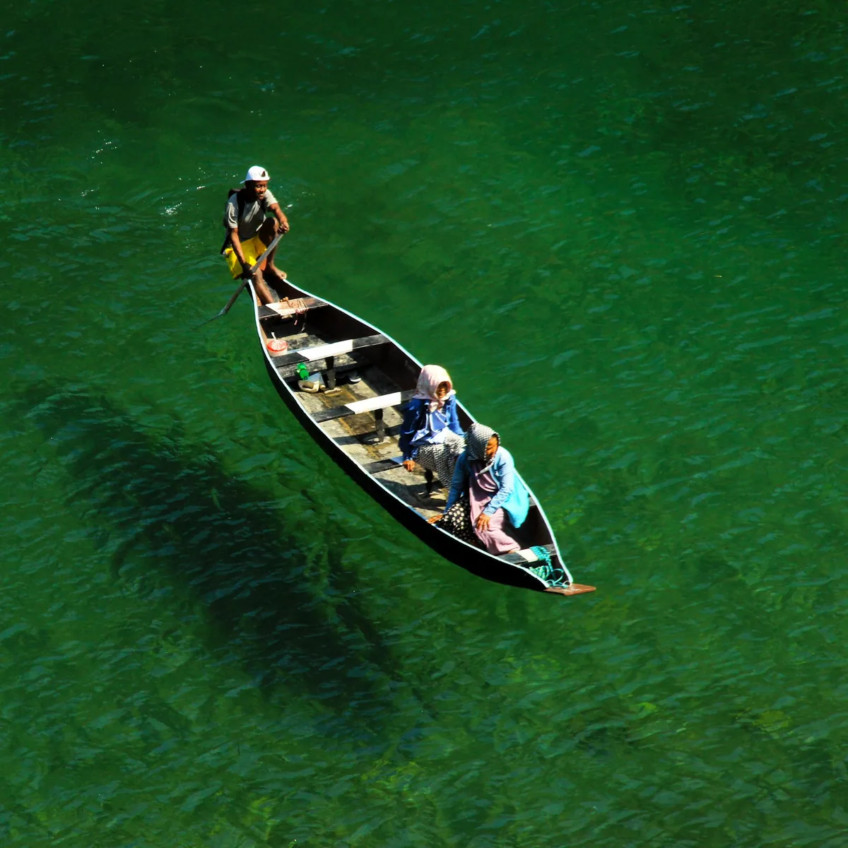 Two person on boat, Meghalaya