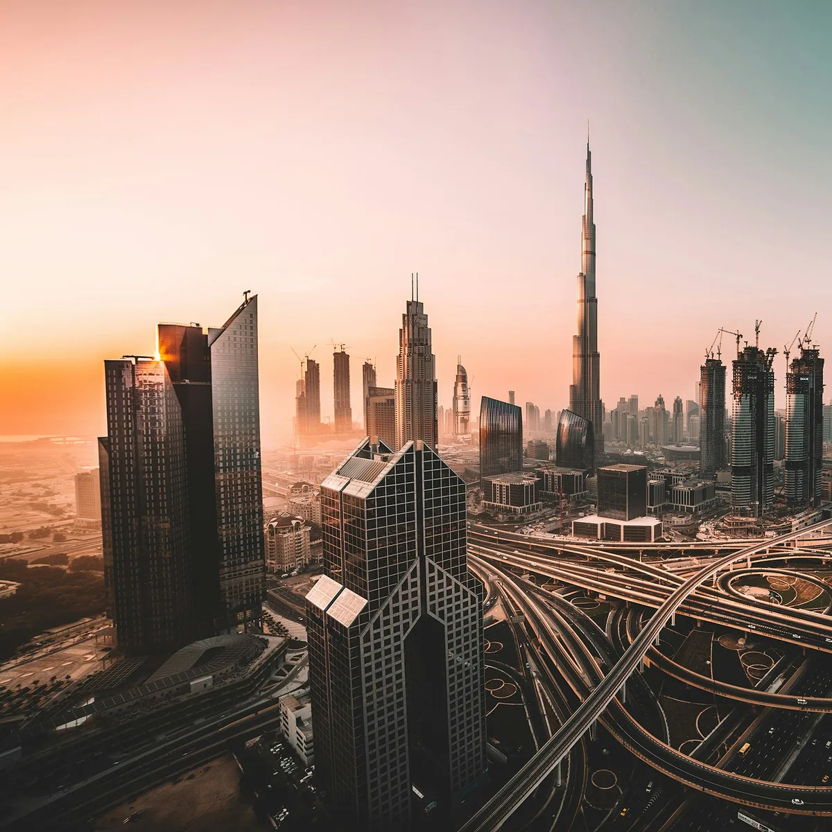 Aerial photo of city highway surrounded by high-rise buildings, Dubai