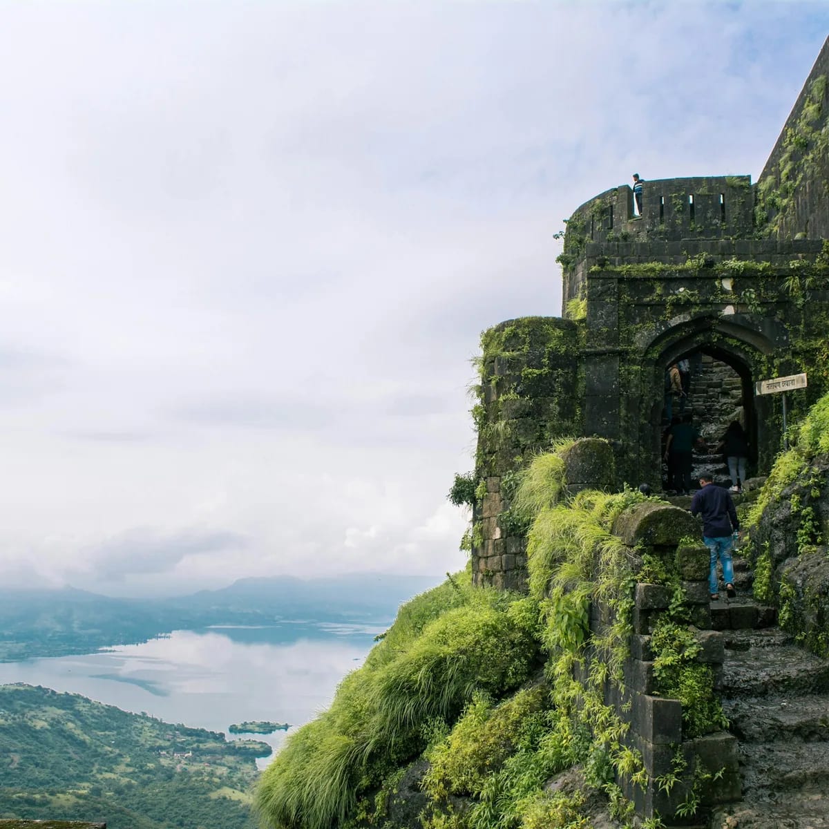 A person walking on a stone bridge, Lonavala