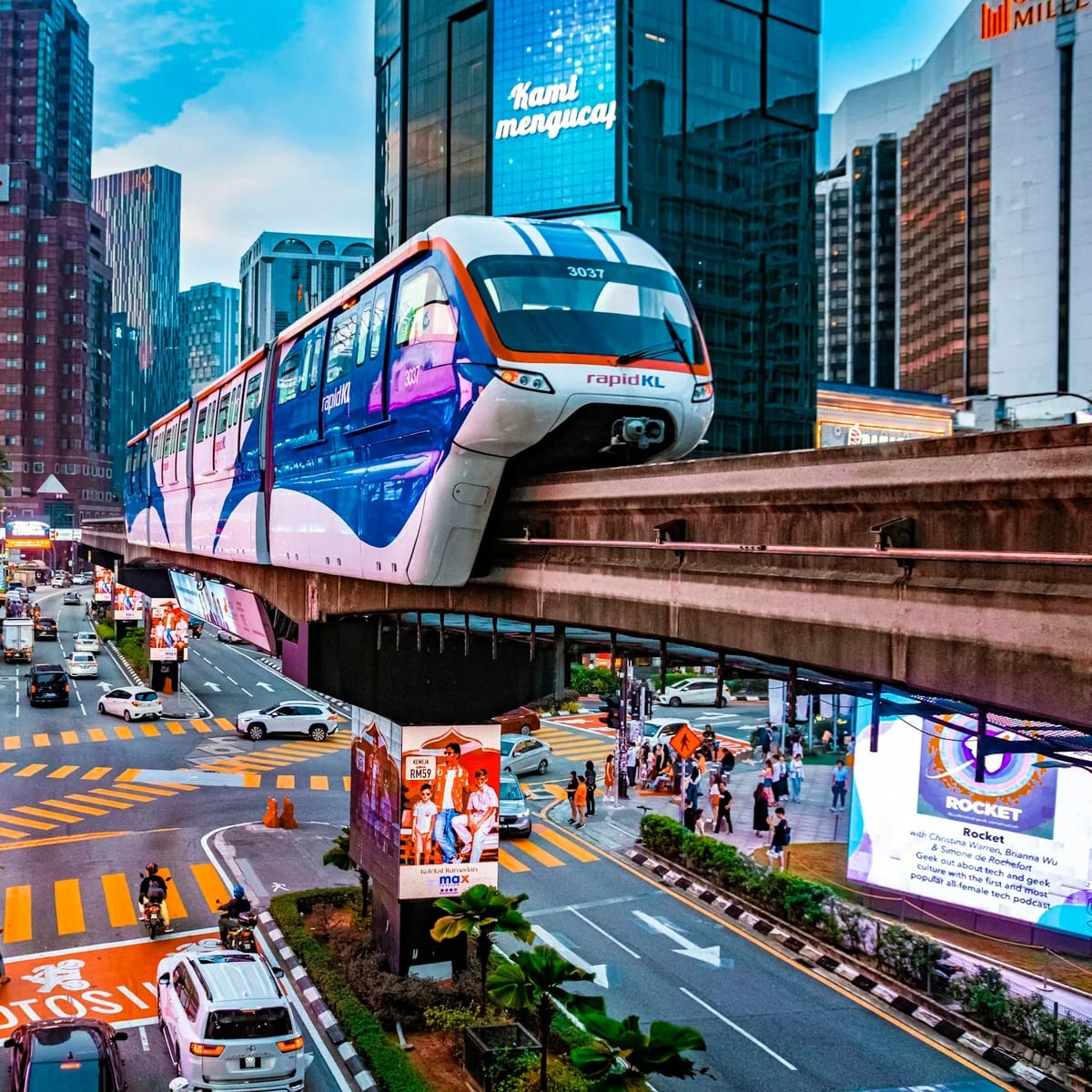 A city street filled with traffic and tall buildings, Malaysia